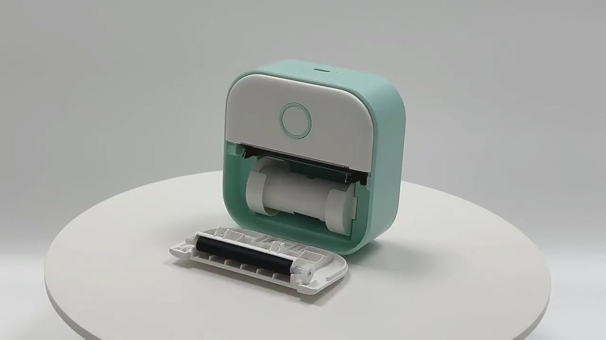 360° view of the mint mini printer, opening the paper lid